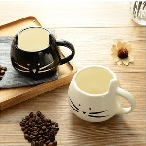 Cat-shaped porcelain mugs